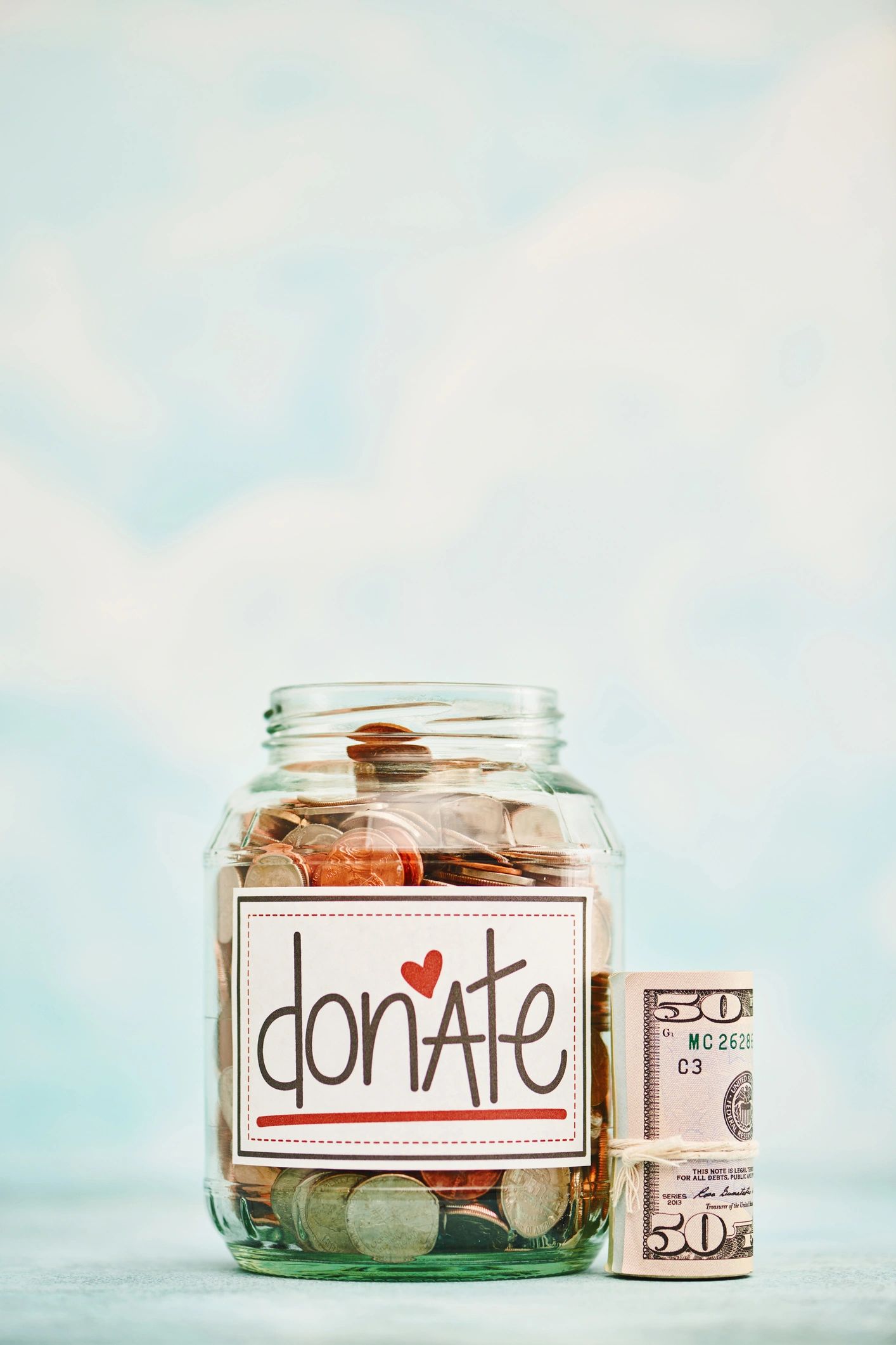 Jar with cash representing everyday savings goals