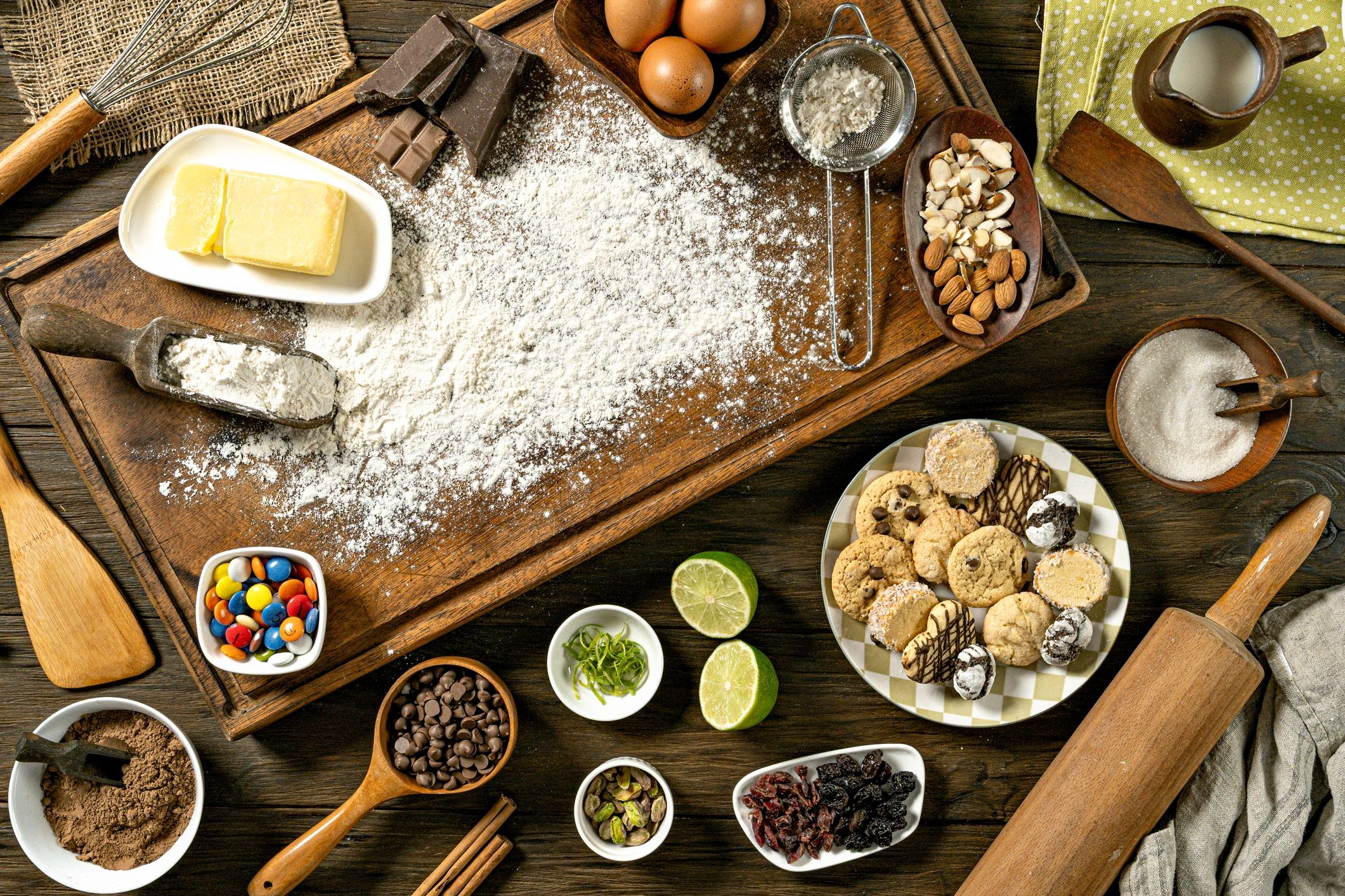 Baking ingredients arranged on a rustic wooden table