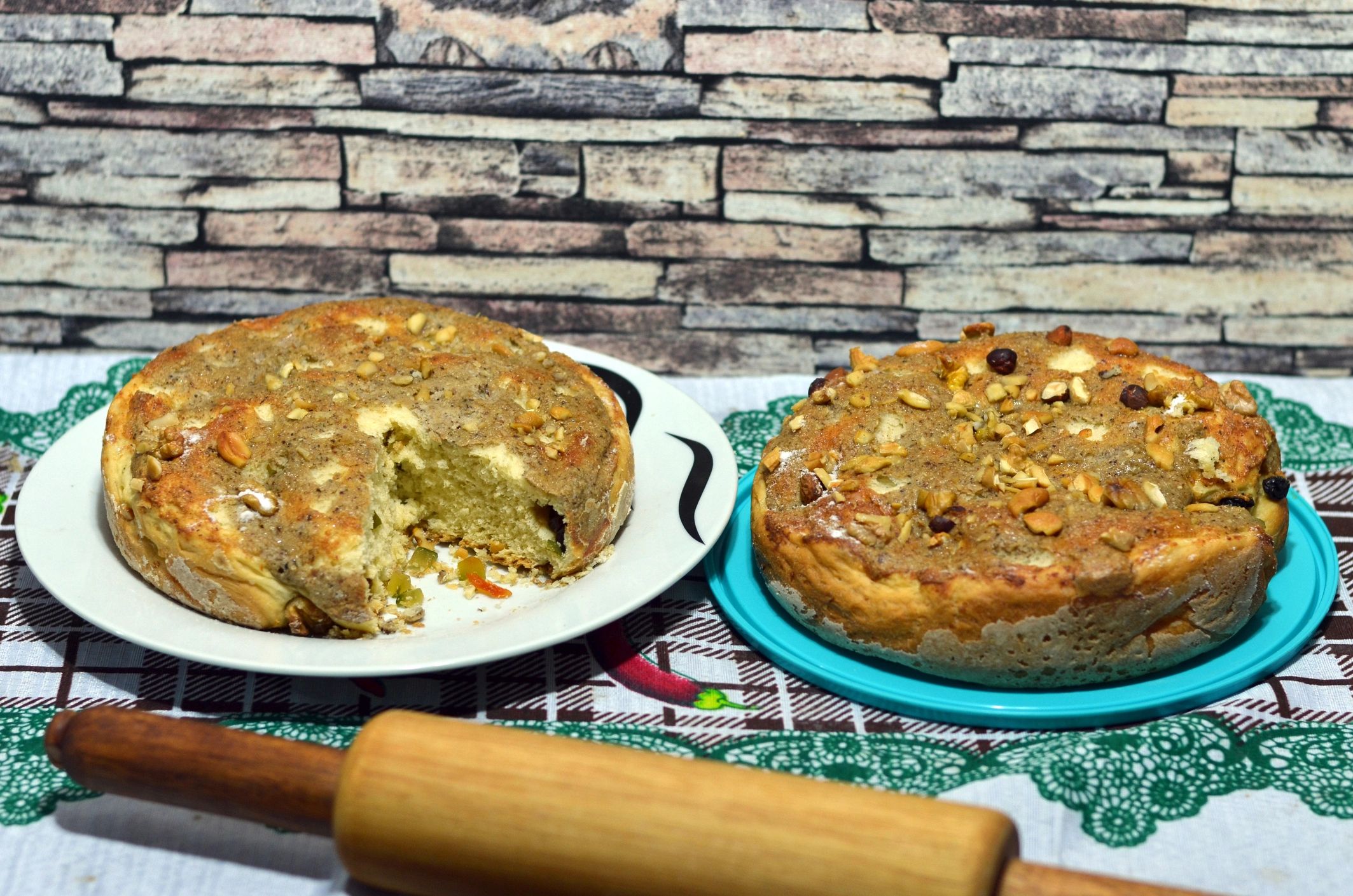 Freshly baked sweet bread cakes on a rustic table